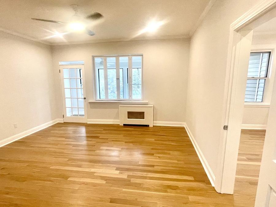 Living room with French doors after a full turnover