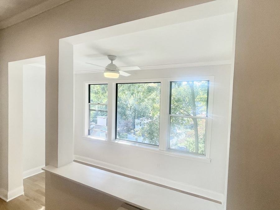 Open interior pass-through between living and dining areas